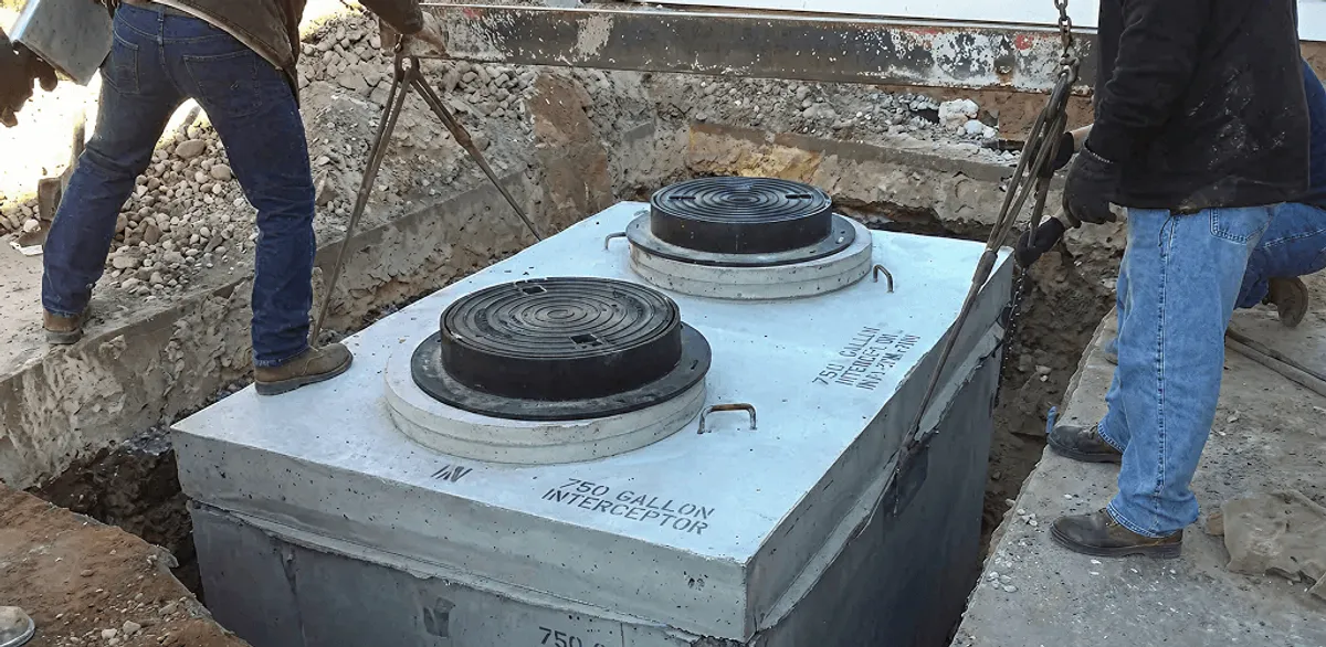 Grease trap installation for a commercial property drainage system in Richmond, VA